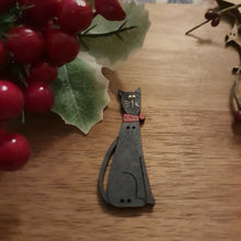Load image into Gallery viewer, Black Abby Cat - wood button, turned into a decorative Brooch.
