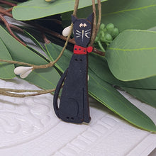 Load image into Gallery viewer, Black Abby Cat - wood button, turned into a decorative Brooch.