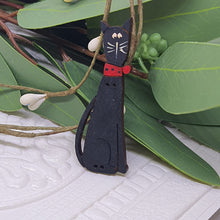 Load image into Gallery viewer, Black Abby Cat - wood button, turned into a decorative Brooch.
